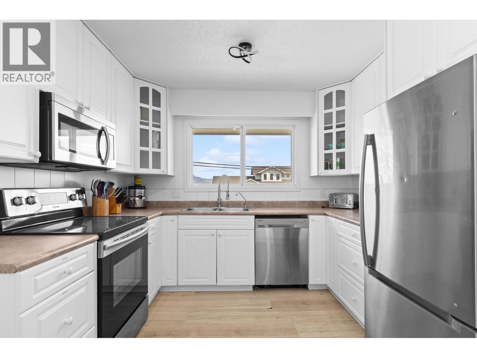 2618 Thacker Drive, West Kelowna, BC - Indoor Photo Showing Kitchen With Double Sink