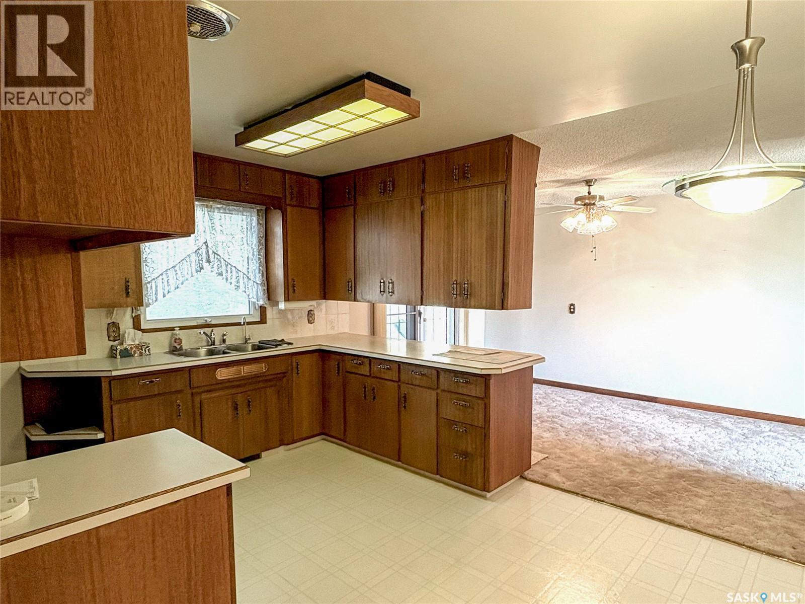 402 Fourth Street, Kipling, SK - Indoor Photo Showing Kitchen With Double Sink