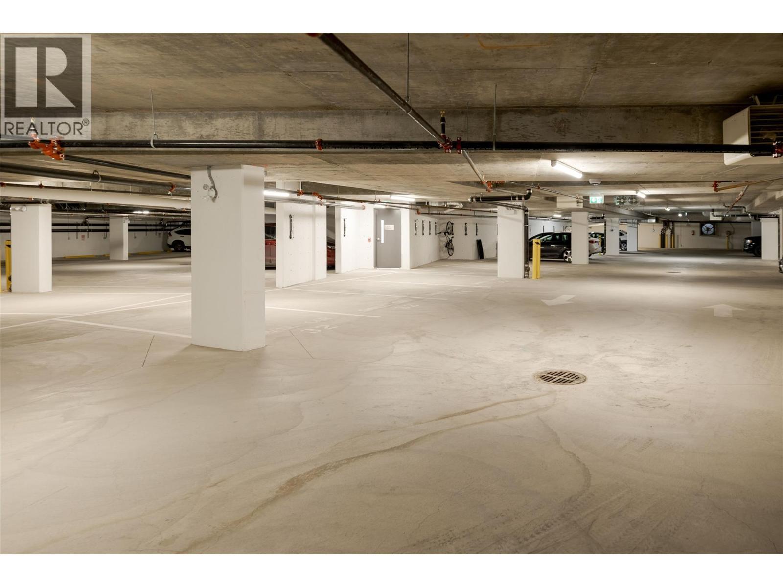 Parking - 1380 Pridham Avenue Unit# 415, Kelowna, BC - Indoor Photo Showing Garage