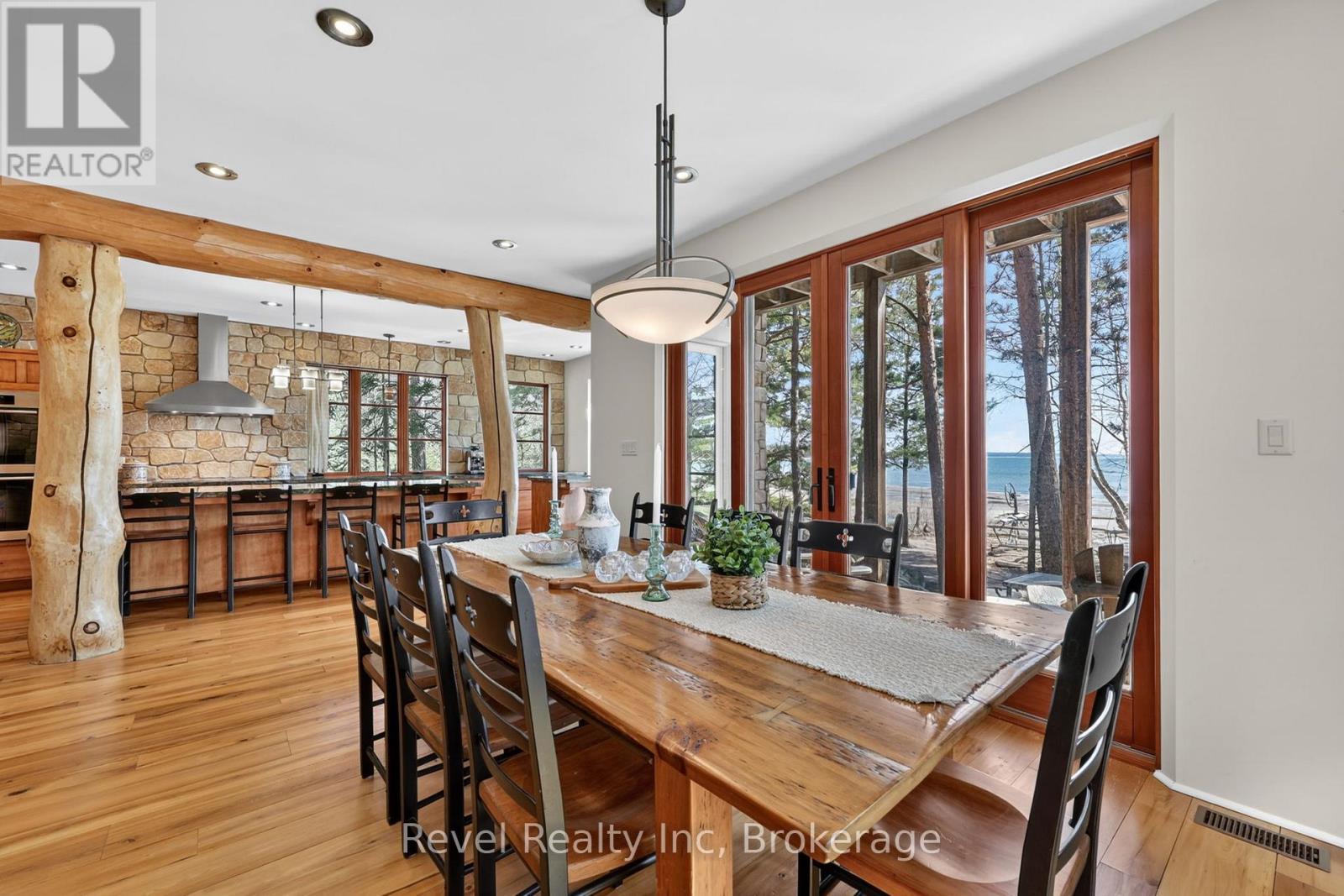 Gourmet Appliances and beautiful Stone wall - 12 Walker Road, Tiny, ON - Indoor Photo Showing Kitchen With Upgraded Kitchen