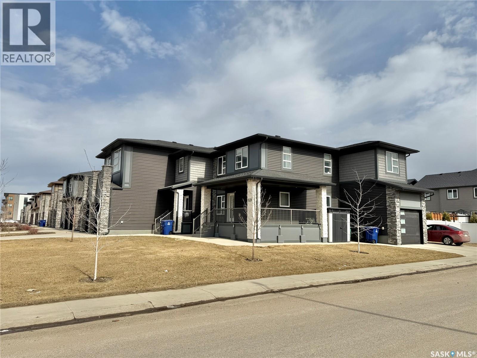 254 Brighton Gate, Saskatoon, SK - Outdoor With Facade