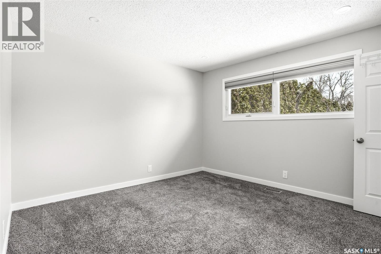 34 Dewar Bay, Regina, SK - Indoor Photo Showing Other Room