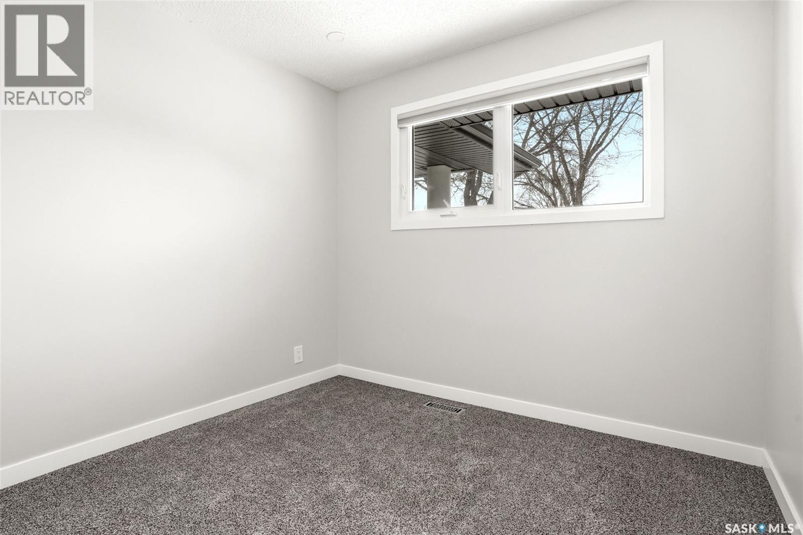 34 Dewar Bay, Regina, SK - Indoor Photo Showing Other Room