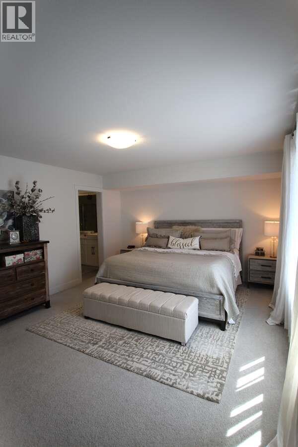 2897 Robinson Road, Lake Country, BC - Indoor Photo Showing Bedroom