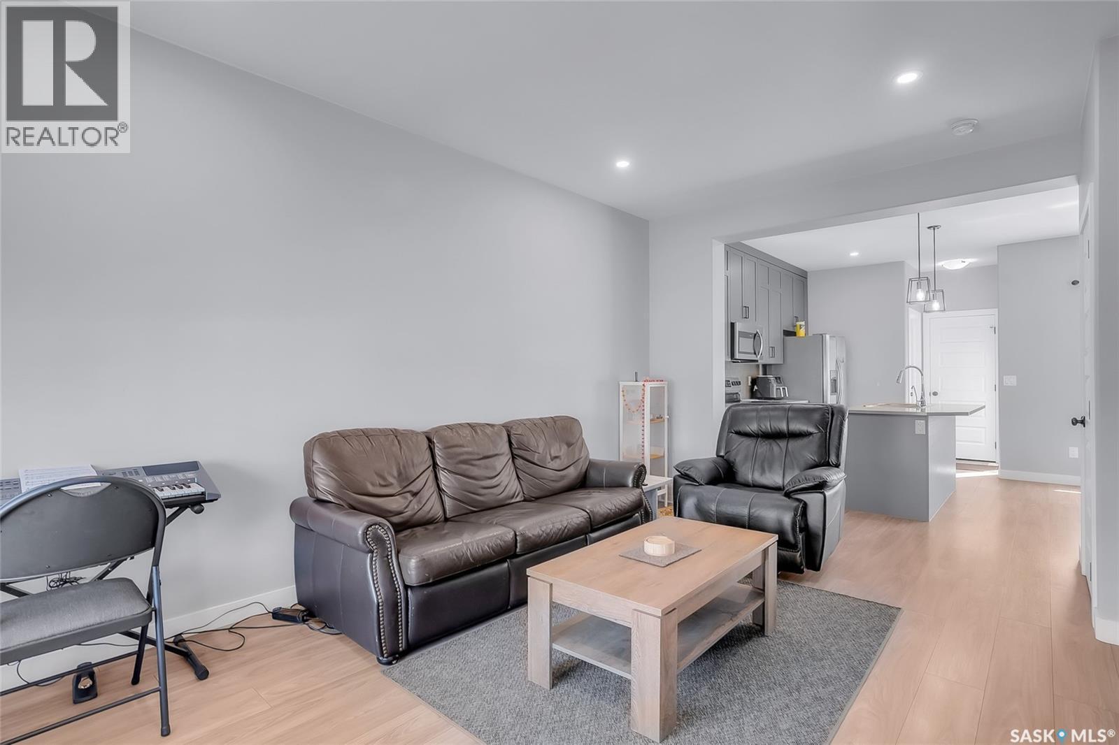 608 Brighton Gate, Saskatoon, SK - Indoor Photo Showing Living Room