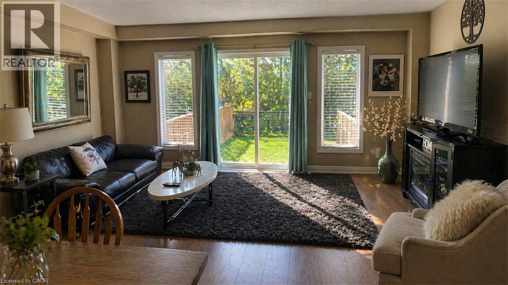 65 Meadowridge Street, Kitchener, ON - Indoor Photo Showing Living Room With Fireplace
