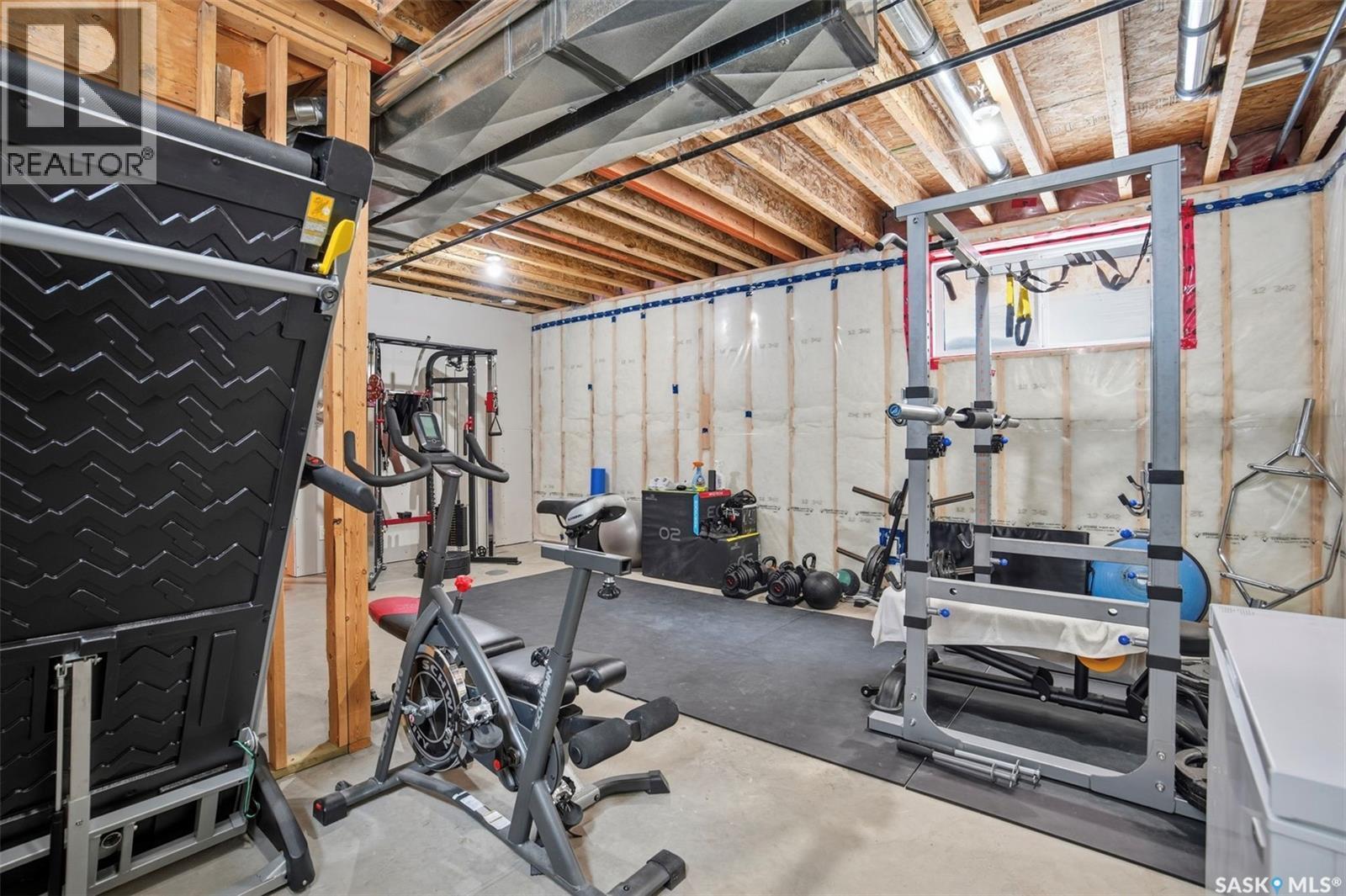 122 Greyeyes-Steele Way, Saskatoon, SK - Indoor Photo Showing Gym Room