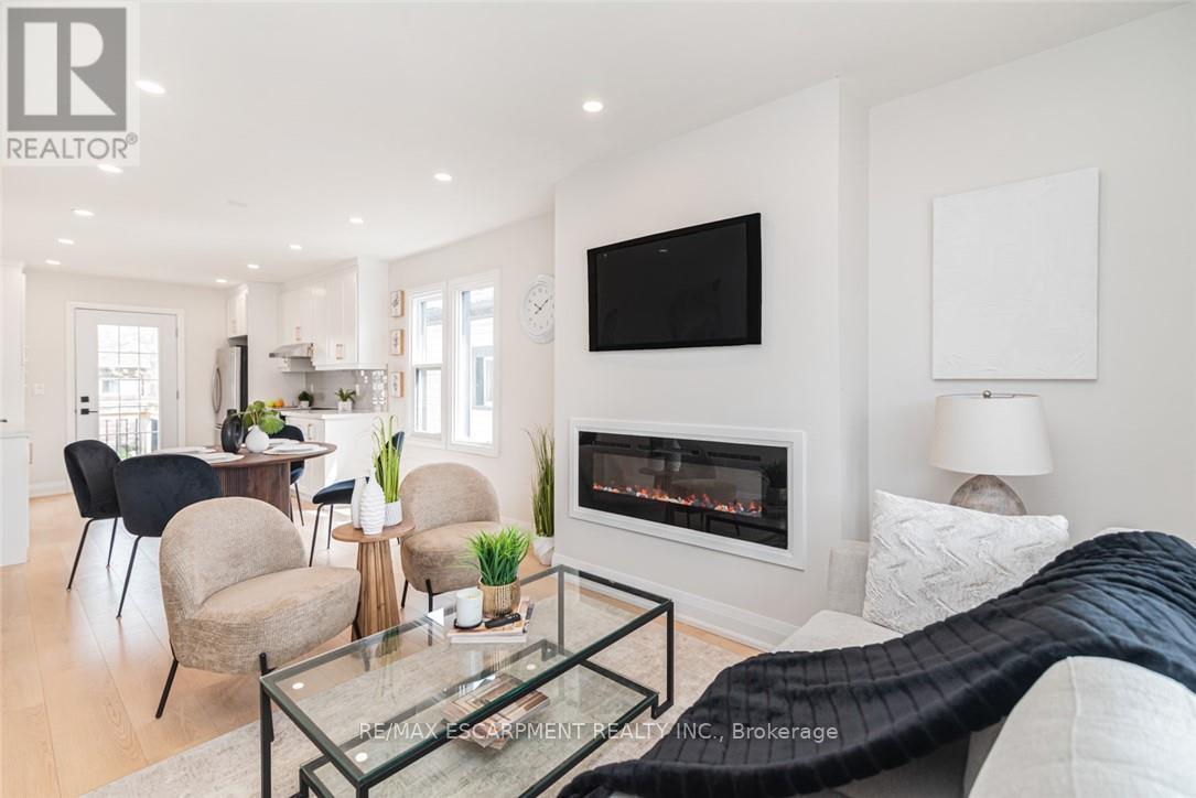 297 Britannia Avenue, Hamilton, ON - Indoor Photo Showing Living Room With Fireplace
