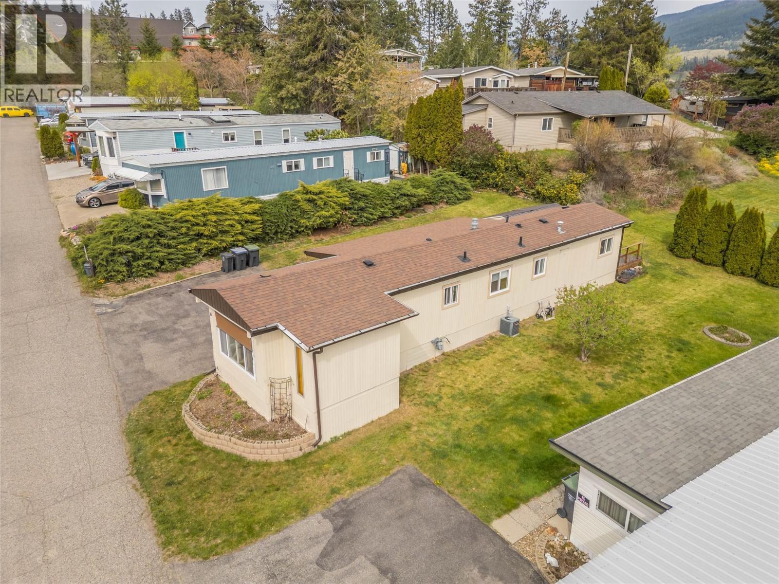 Aerial showing the home's proximity to the services at Lakewood Mall and Turtle Crossing. - 12022 Pretty Road Unit# 16, Lake Country, BC
