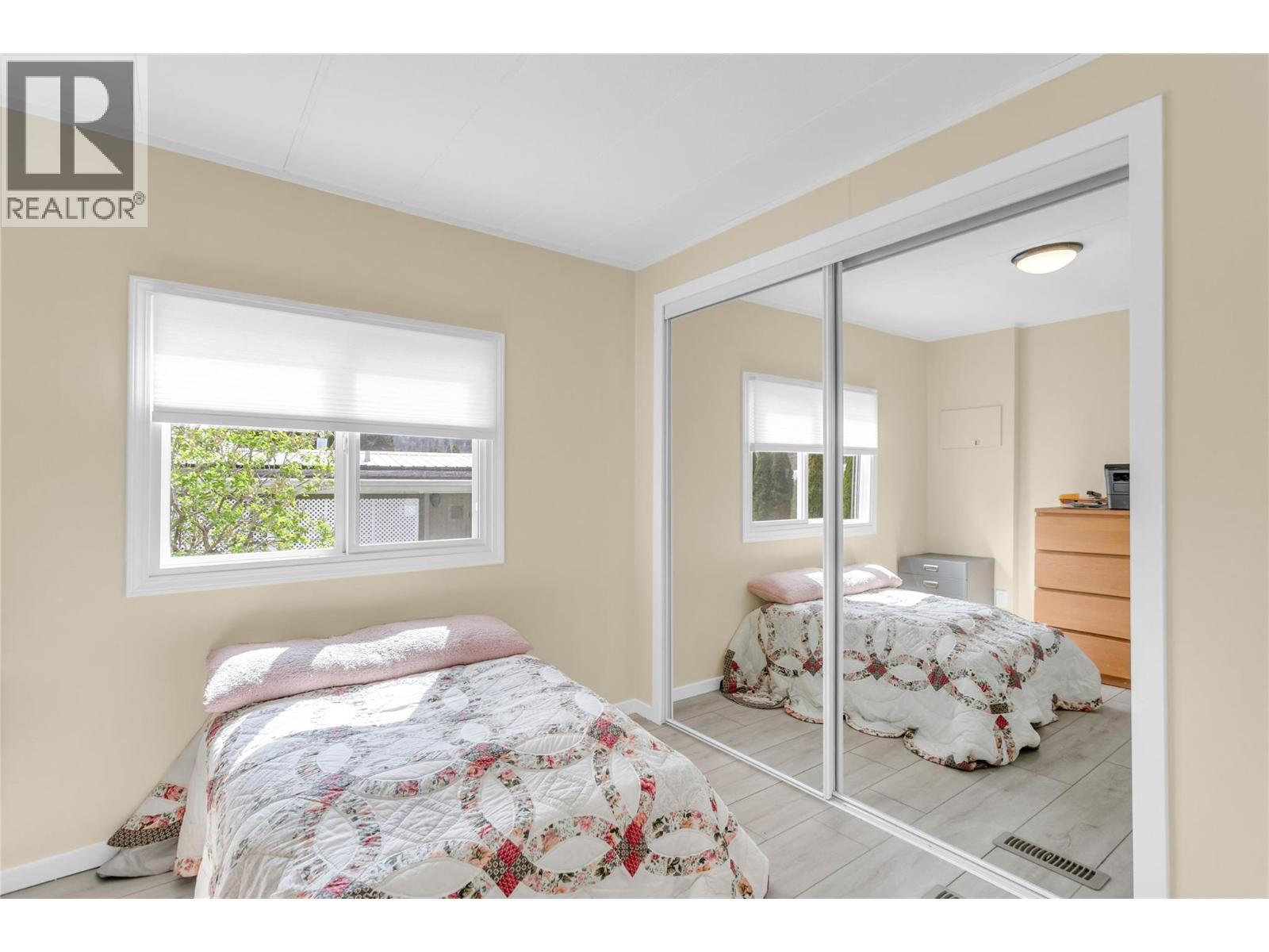Second bedroom as you go down the hall. - 12022 Pretty Road Unit# 16, Lake Country, BC