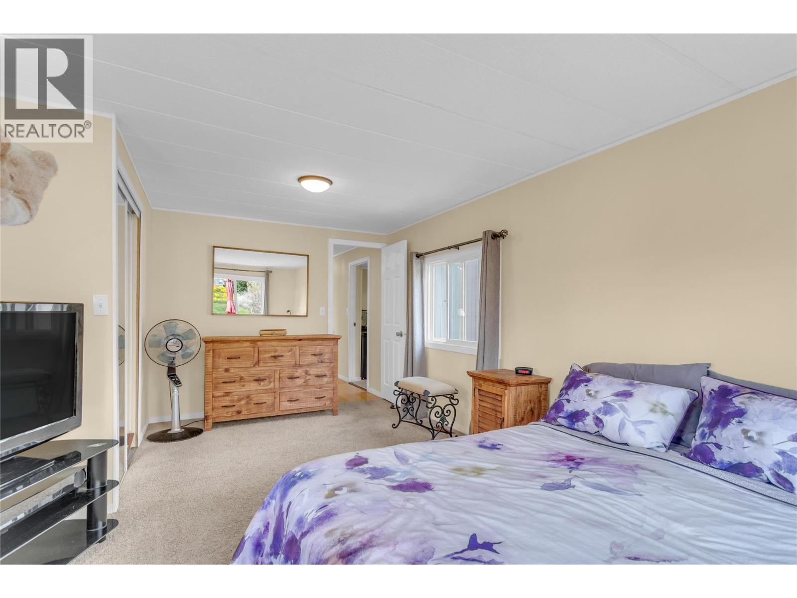 Primary bedroom. - 12022 Pretty Road Unit# 16, Lake Country, BC