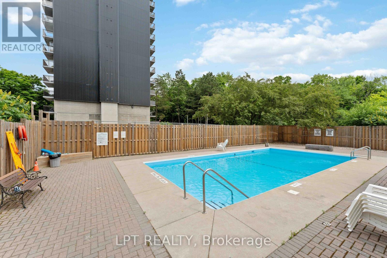 314 - 555 Brittany Drive, Ottawa, ON - Outdoor With In Ground Pool