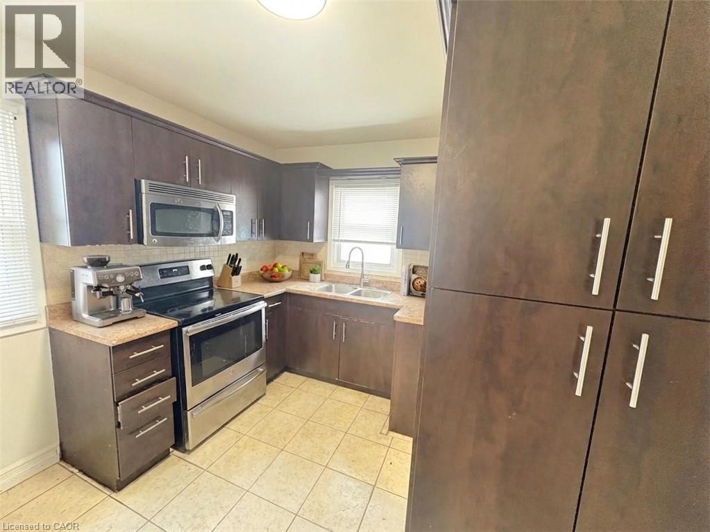 66 Grenadier Drive, Hamilton, ON - Indoor Photo Showing Kitchen With Stainless Steel Kitchen With Double Sink
