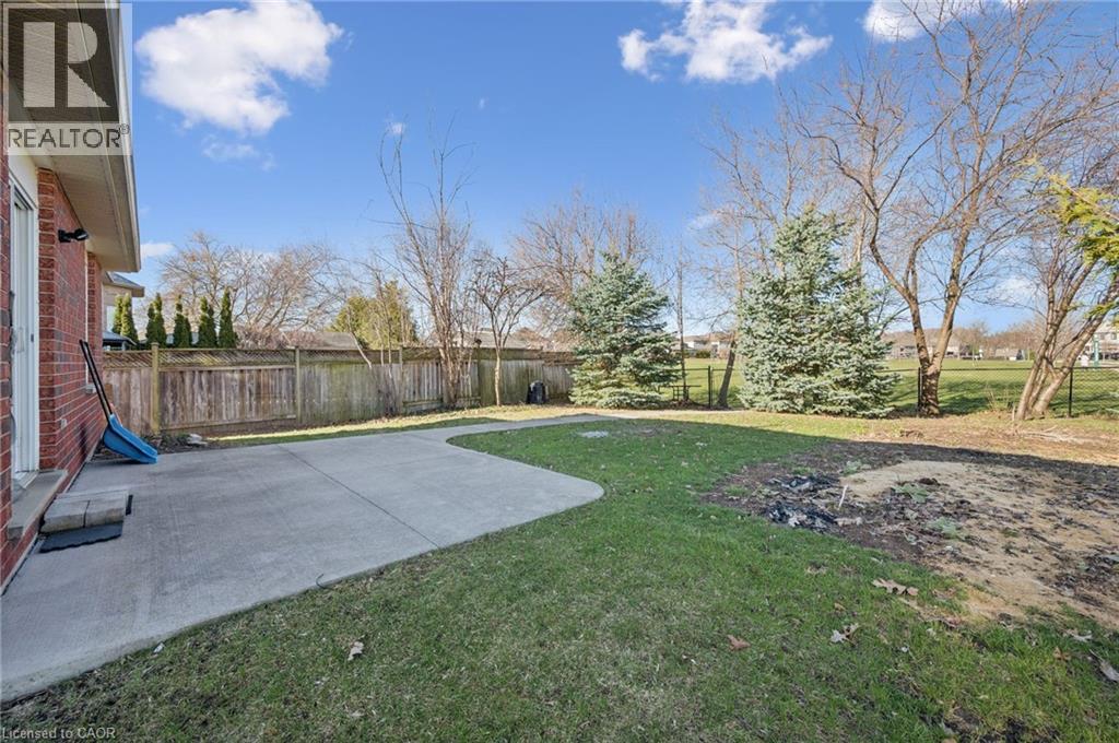 Fenced backyard with a patio area - 649 Doon South Drive, Kitchener, ON - Outdoor
