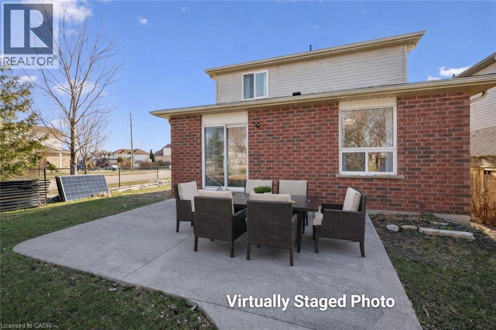 View of patio / terrace with outdoor dining area - 649 Doon South Drive, Kitchener, ON - Outdoor With Deck Patio Veranda With Exterior