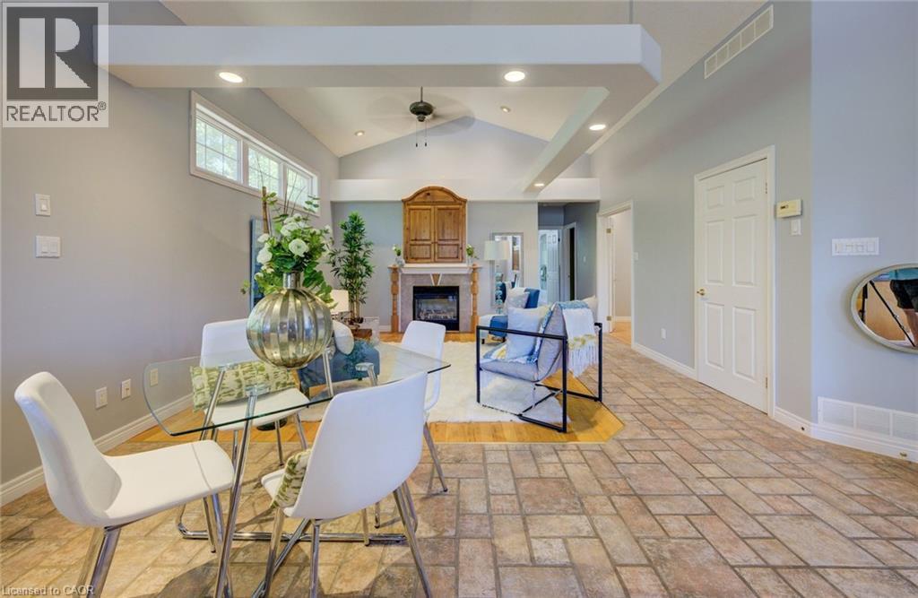 2 Smetana Drive, Kitchener, ON - Indoor Photo Showing Dining Room With Fireplace