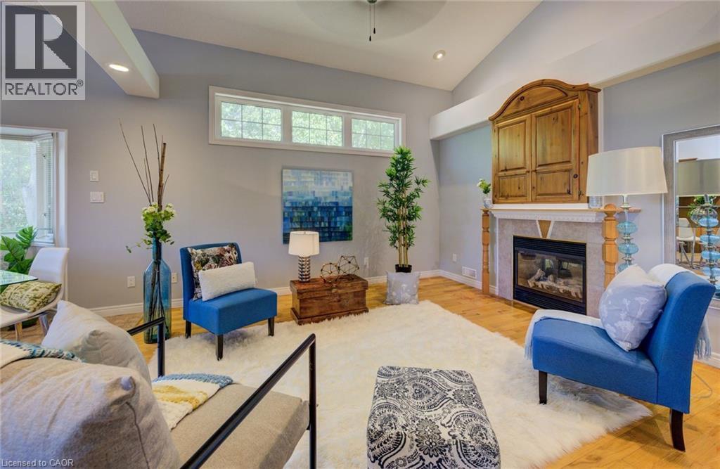 Upper unit - 2 Smetana Drive, Kitchener, ON - Indoor Photo Showing Living Room With Fireplace