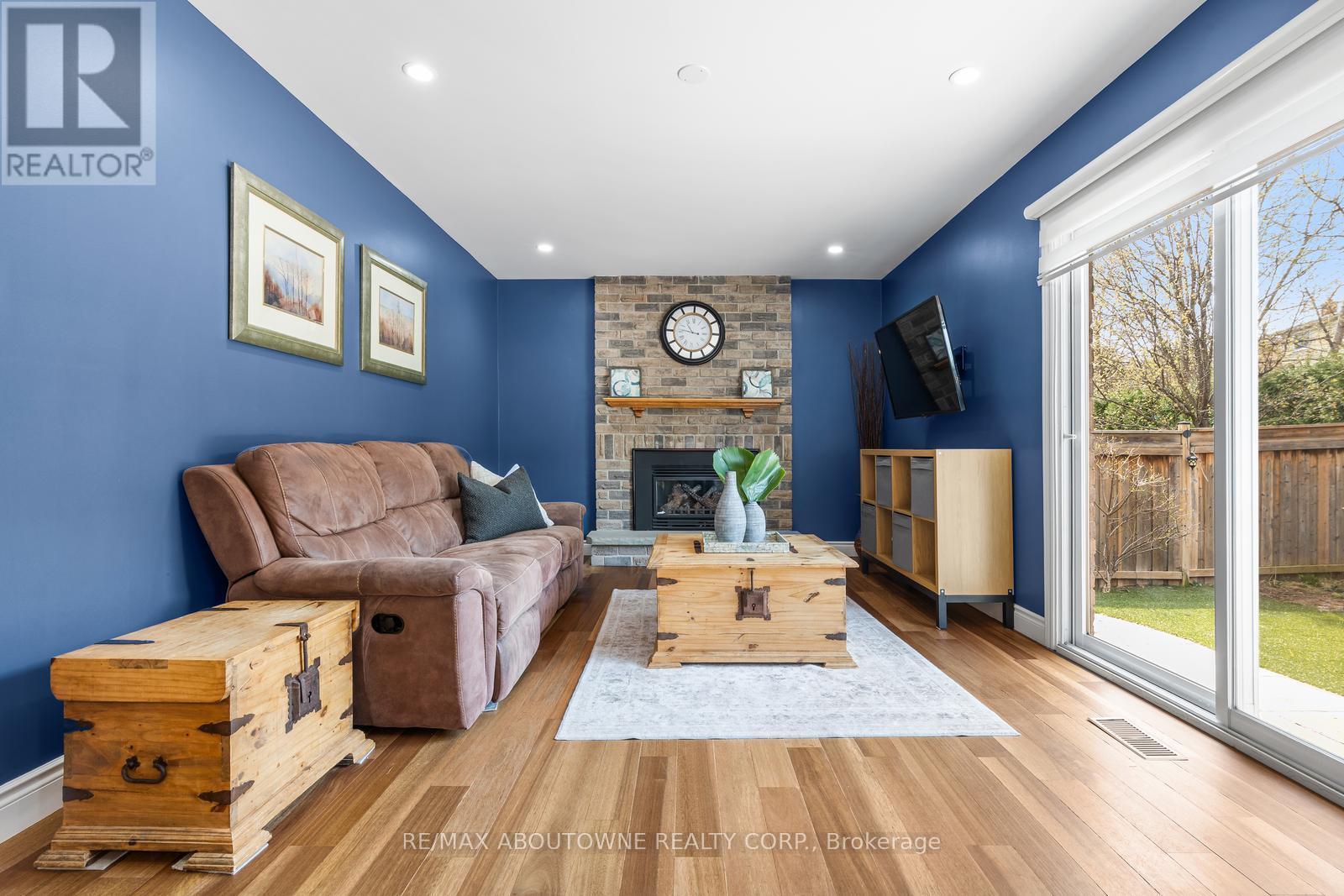 2474 Cavendish Drive, Burlington, ON - Indoor Photo Showing Living Room With Fireplace