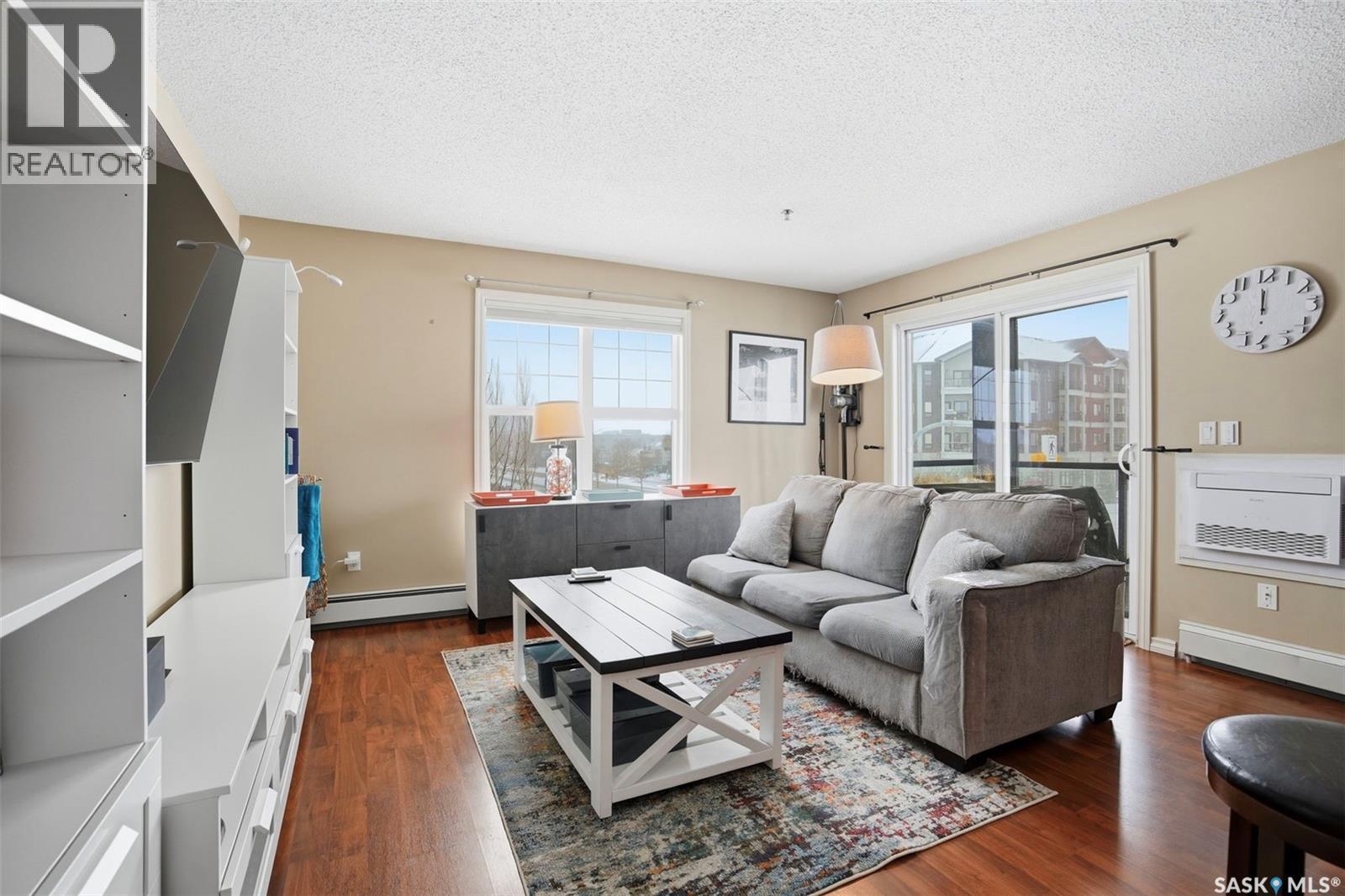 A206 103 Wellman Crescent, Saskatoon, SK - Indoor Photo Showing Living Room