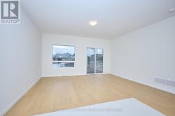 Bright great room with access to backyard -