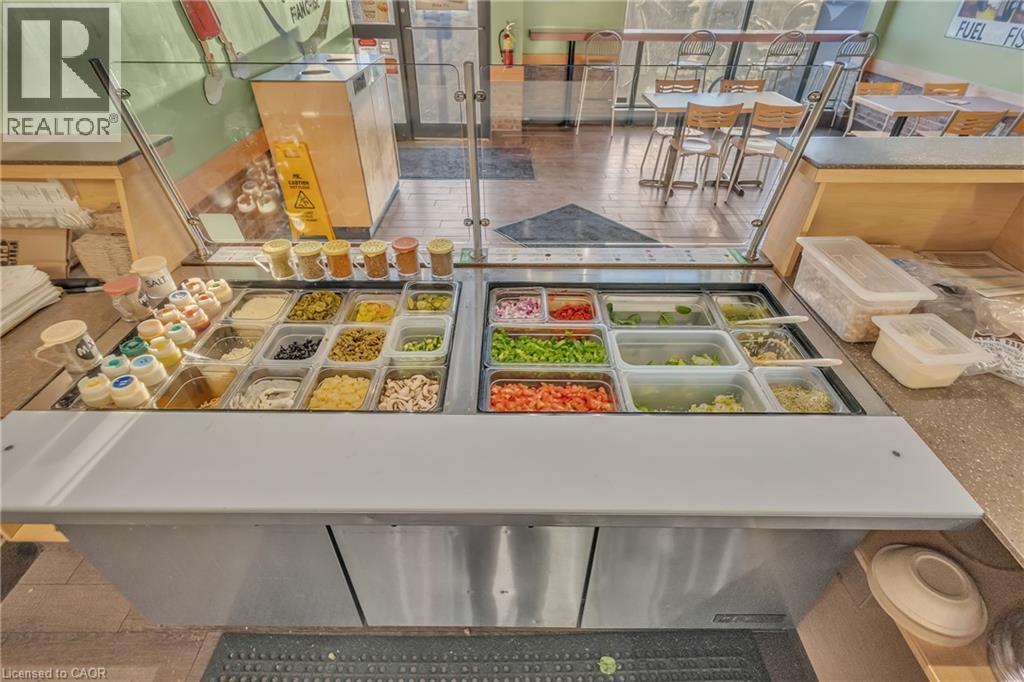 Commercial food preparation counter with glass sneeze guard - 589 Fairway Road S, Kitchener, ON