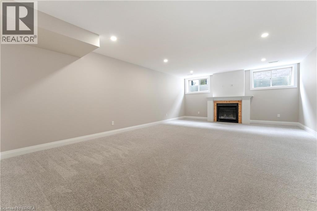 *TO BE BUILT - SIMILAR NOT EXACT* - 111 Judd Drive, Simcoe, ON - Indoor With Fireplace