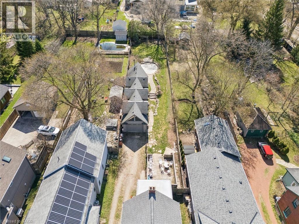 Aerial perspective showcasing multiple properties with varied architectural styles - 115 Allen Street E, Waterloo, ON - Outdoor