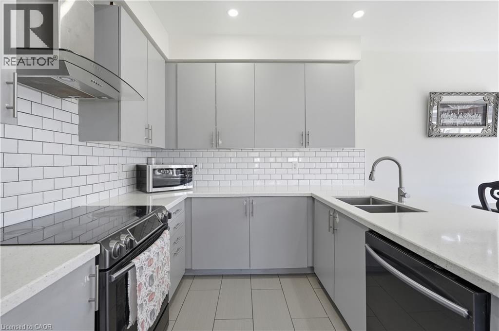 57 Thompson Road, Caledonia, ON - Indoor Photo Showing Kitchen With Double Sink With Upgraded Kitchen
