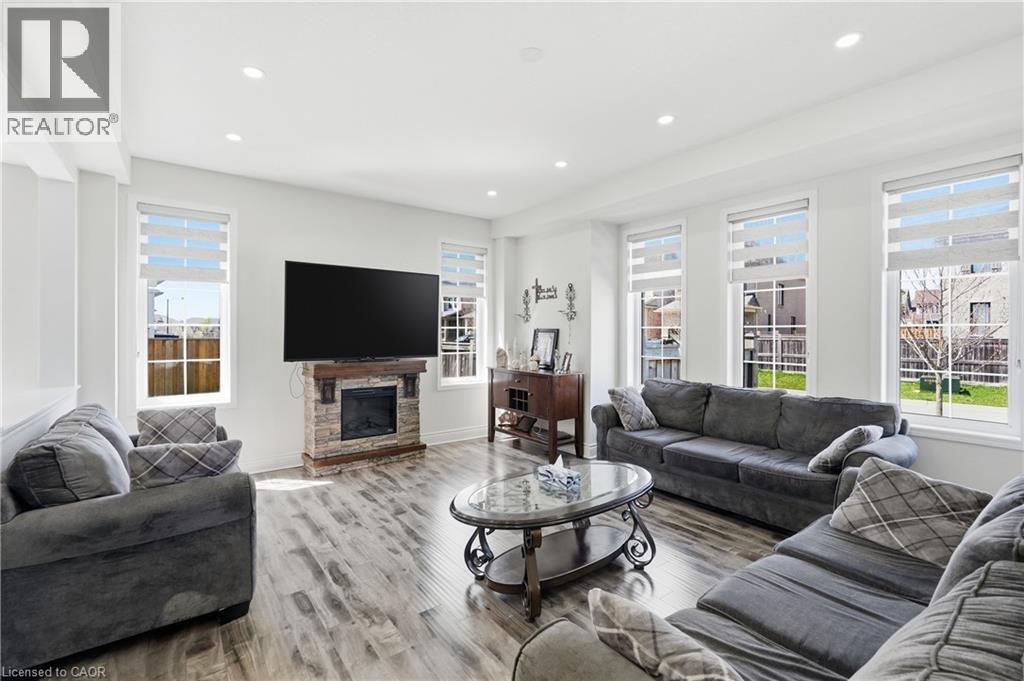 57 Thompson Road, Caledonia, ON - Indoor Photo Showing Living Room With Fireplace