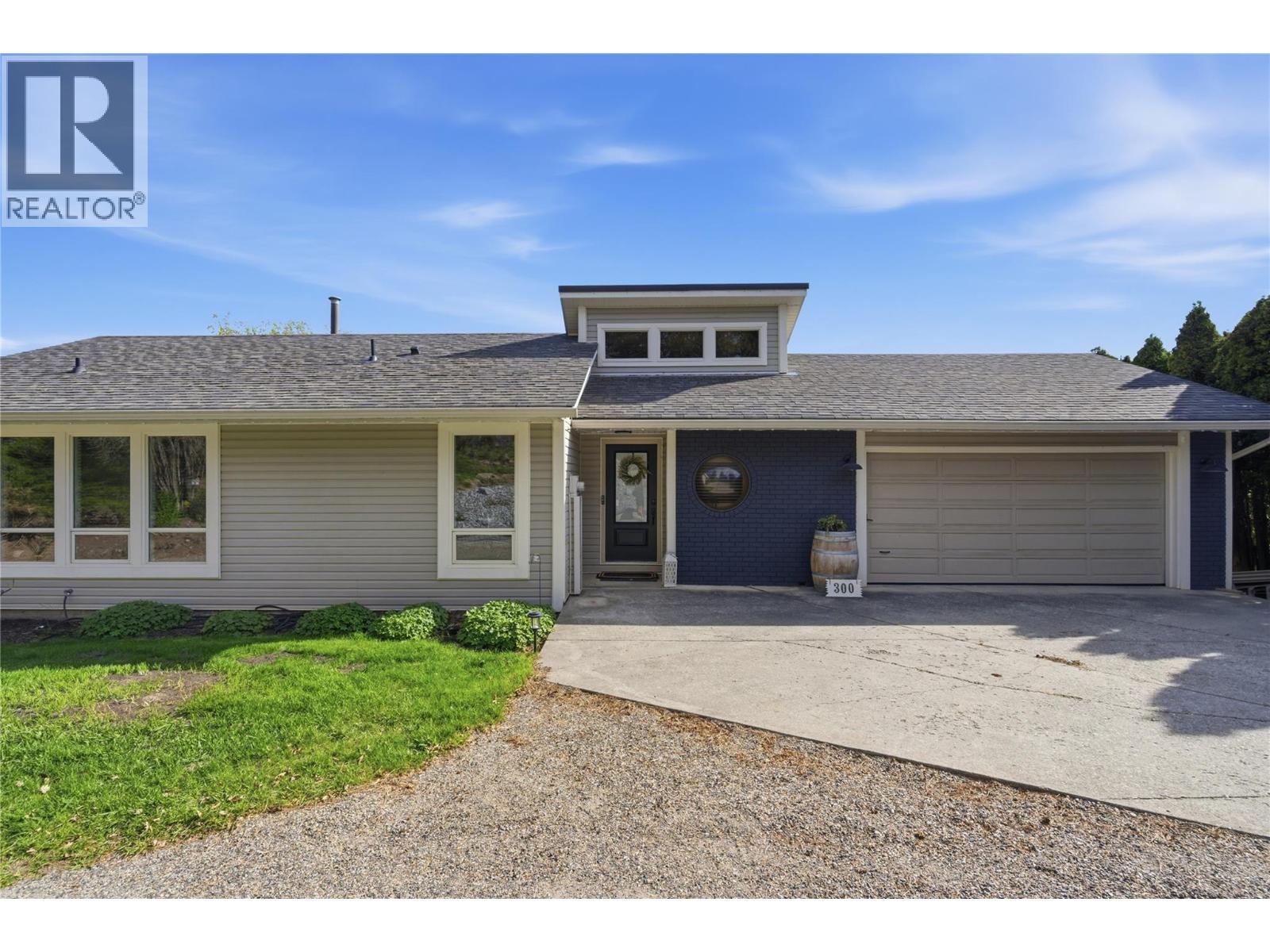 300 Scenic Drive, Coldstream, BC - Outdoor With Facade