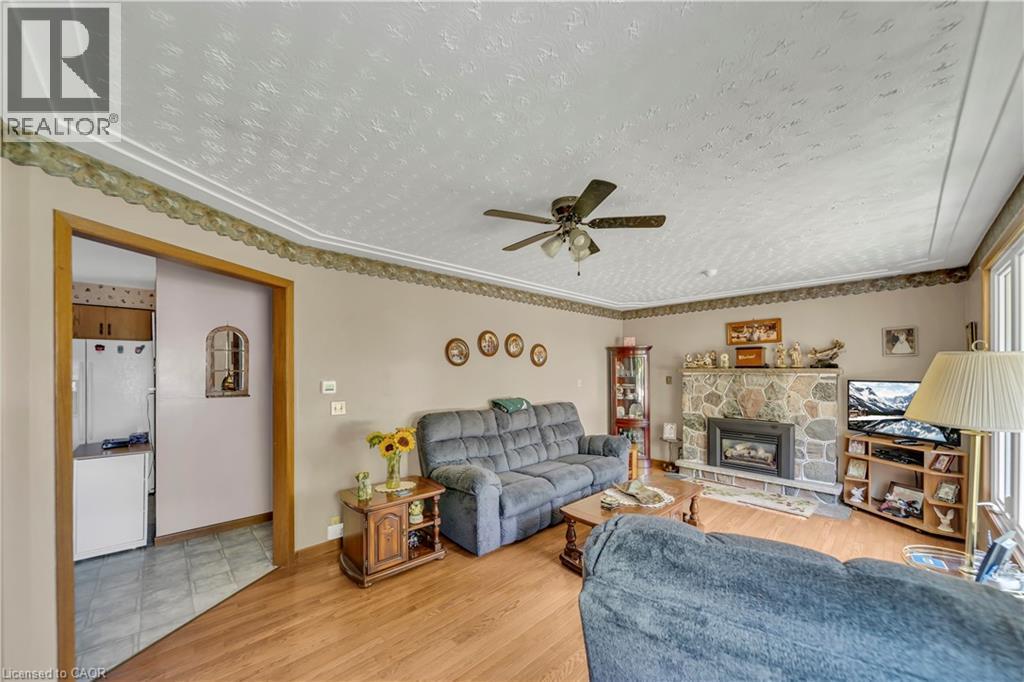 5427 Perth Road 178, North Perth, ON - Indoor Photo Showing Living Room With Fireplace