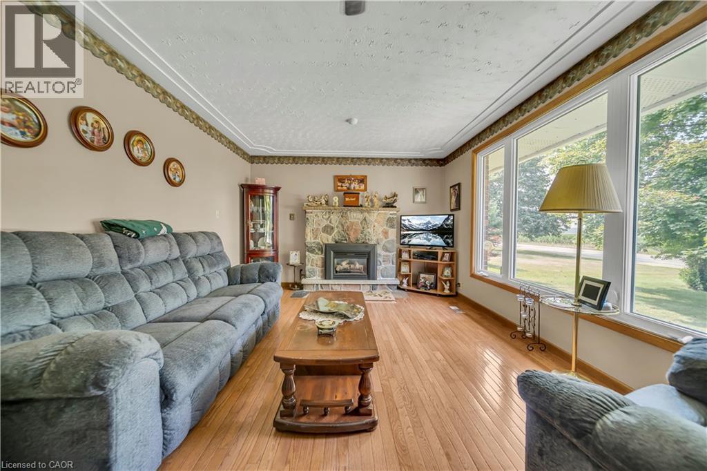 5427 Perth Road 178, North Perth, ON - Indoor Photo Showing Living Room With Fireplace