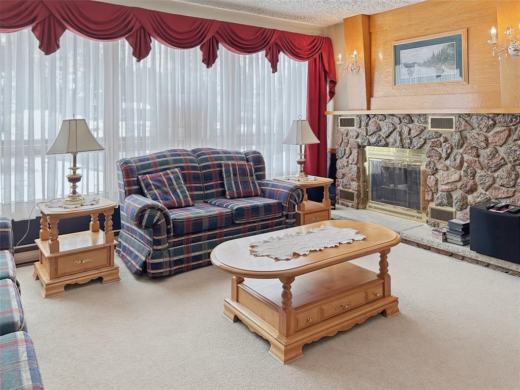 35 Pine Tree Road, Gambo, NL - Indoor Photo Showing Living Room With Fireplace
