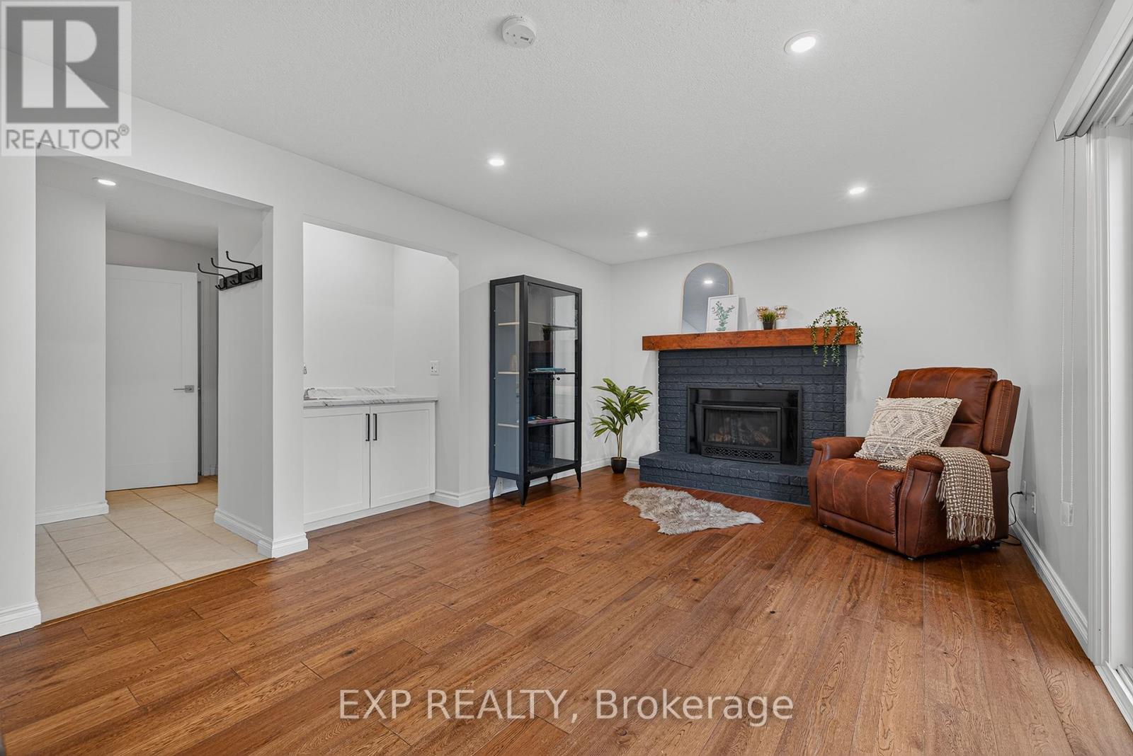 312 Faraday Court, Waterloo, ON - Indoor Photo Showing Other Room With Fireplace