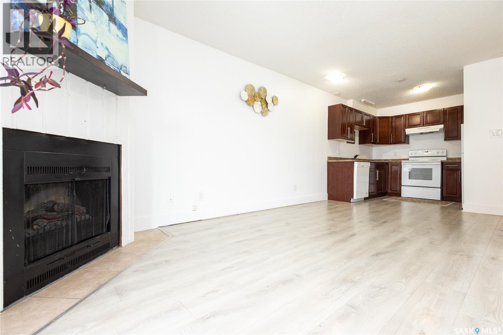 307 512 4Th Avenue N, Saskatoon, SK - Indoor With Fireplace