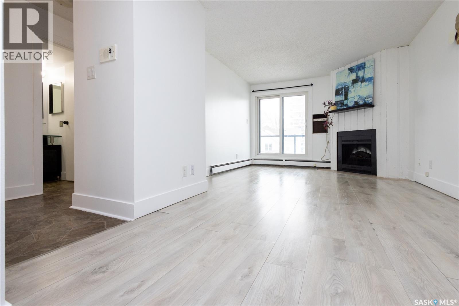 307 512 4Th Avenue N, Saskatoon, SK - Indoor With Fireplace