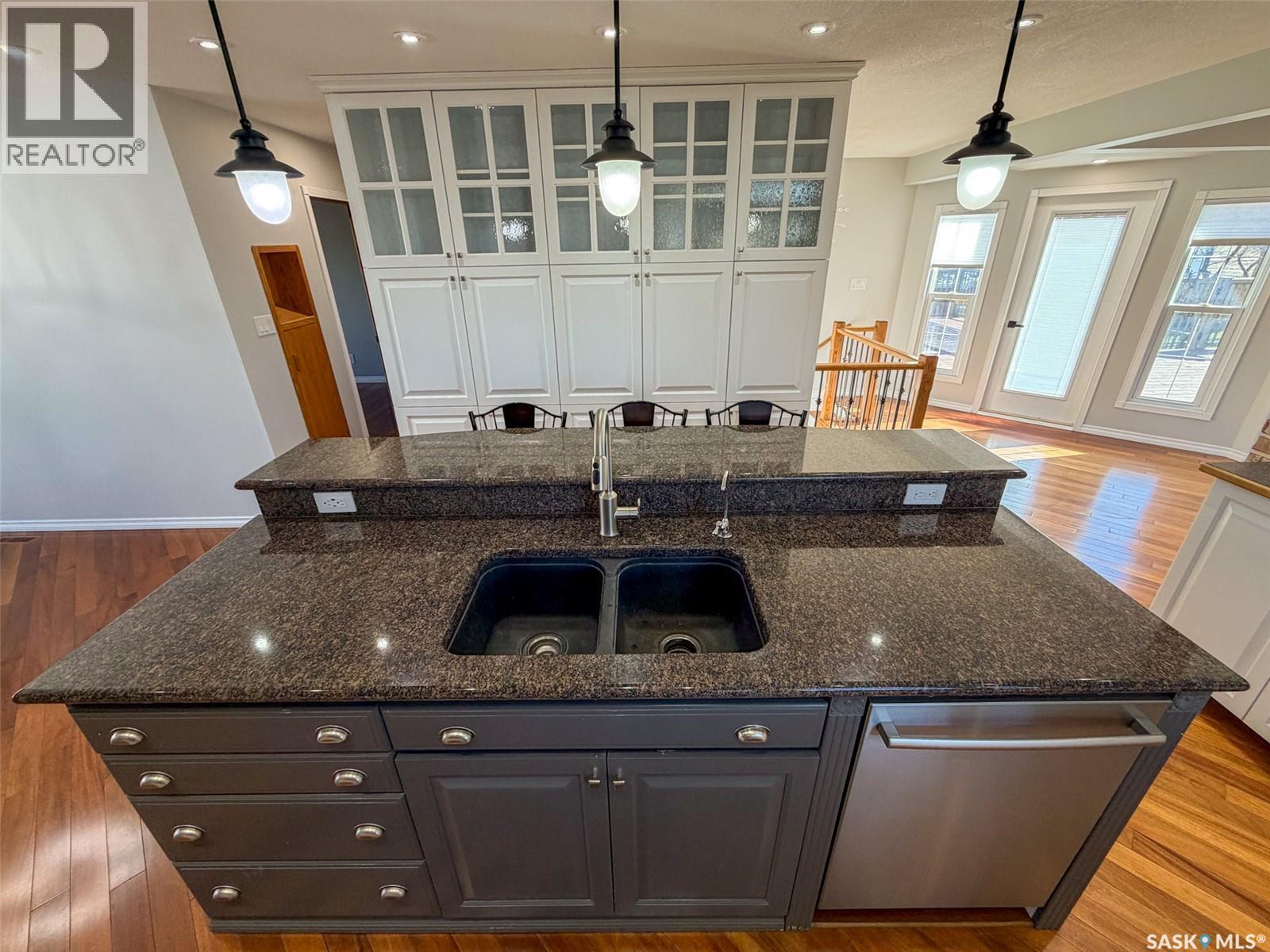 117 2Nd Street W, Frontier, SK - Indoor Photo Showing Kitchen With Double Sink