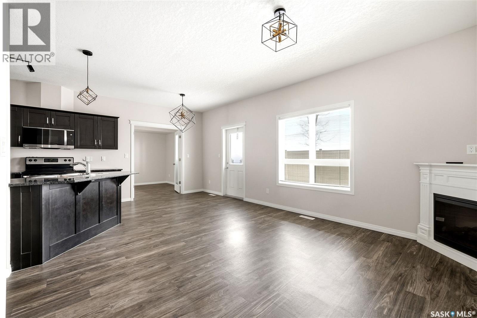 401 3826 Dewdney Avenue E, Regina, SK - Indoor With Fireplace
