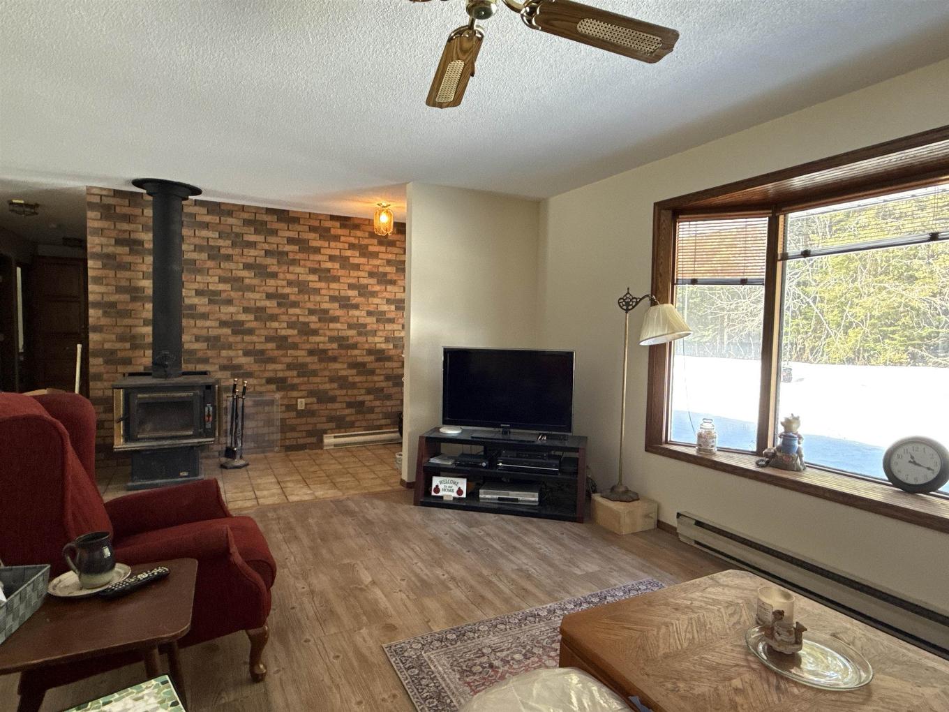 982 Hwy 608, Neebing, ON - Indoor Photo Showing Living Room With Fireplace