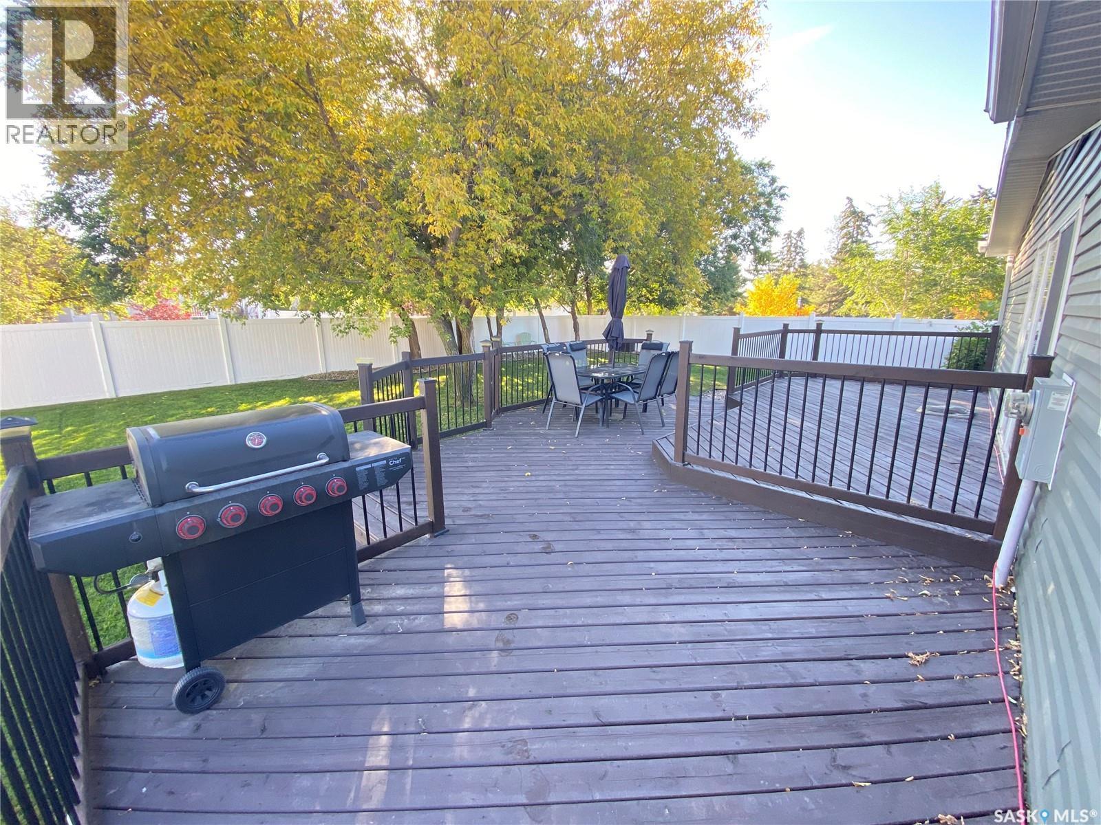 1205 Douglas Road, Weyburn, SK - Outdoor With Deck Patio Veranda With Exterior