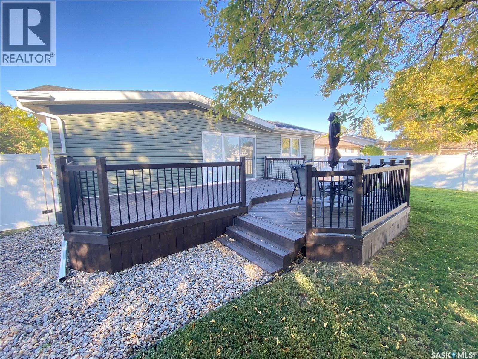 1205 Douglas Road, Weyburn, SK - Outdoor With Deck Patio Veranda