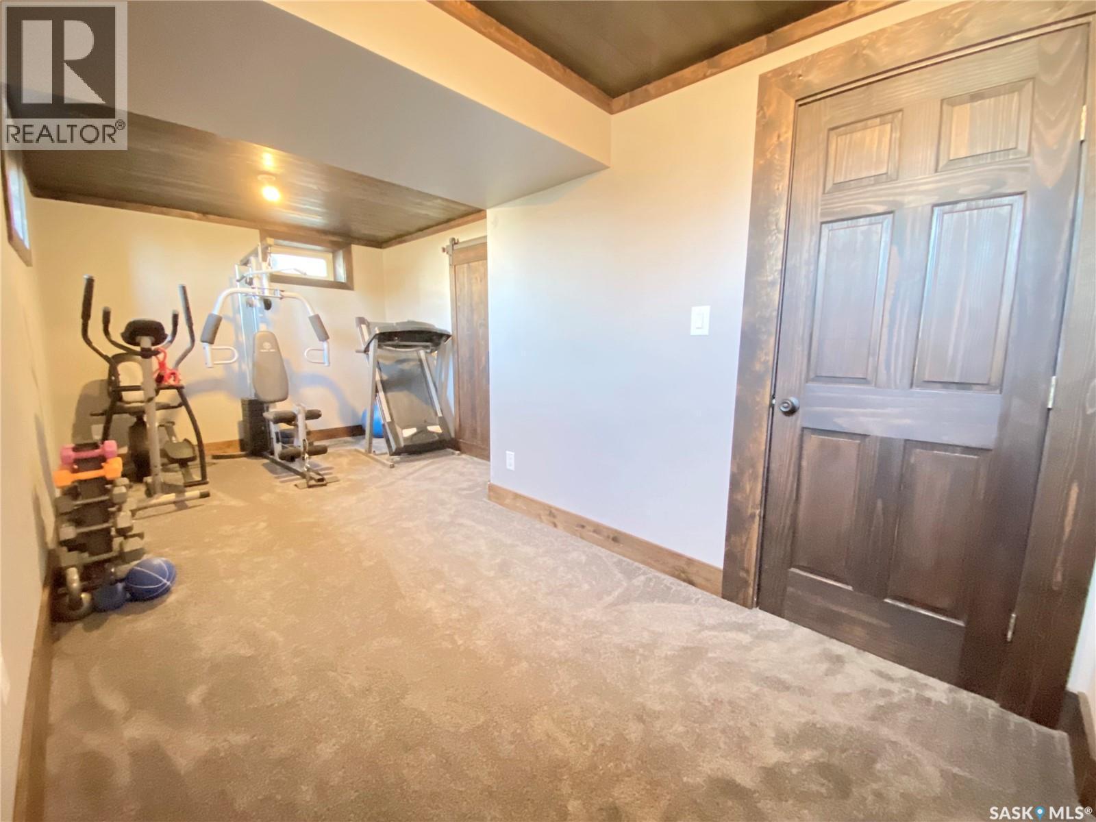 1205 Douglas Road, Weyburn, SK - Indoor Photo Showing Gym Room