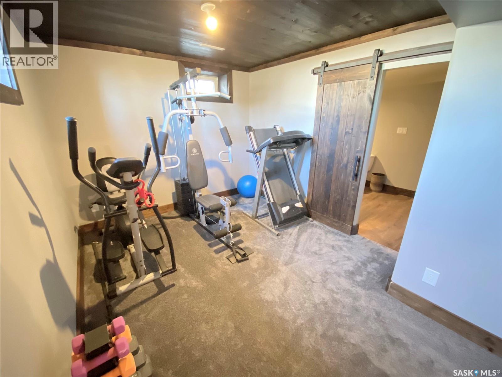 1205 Douglas Road, Weyburn, SK - Indoor Photo Showing Gym Room