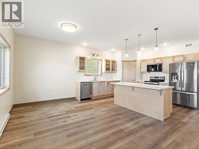 10 Alert Avenue, Whitehorse, YT - Indoor Photo Showing Kitchen With Stainless Steel Kitchen