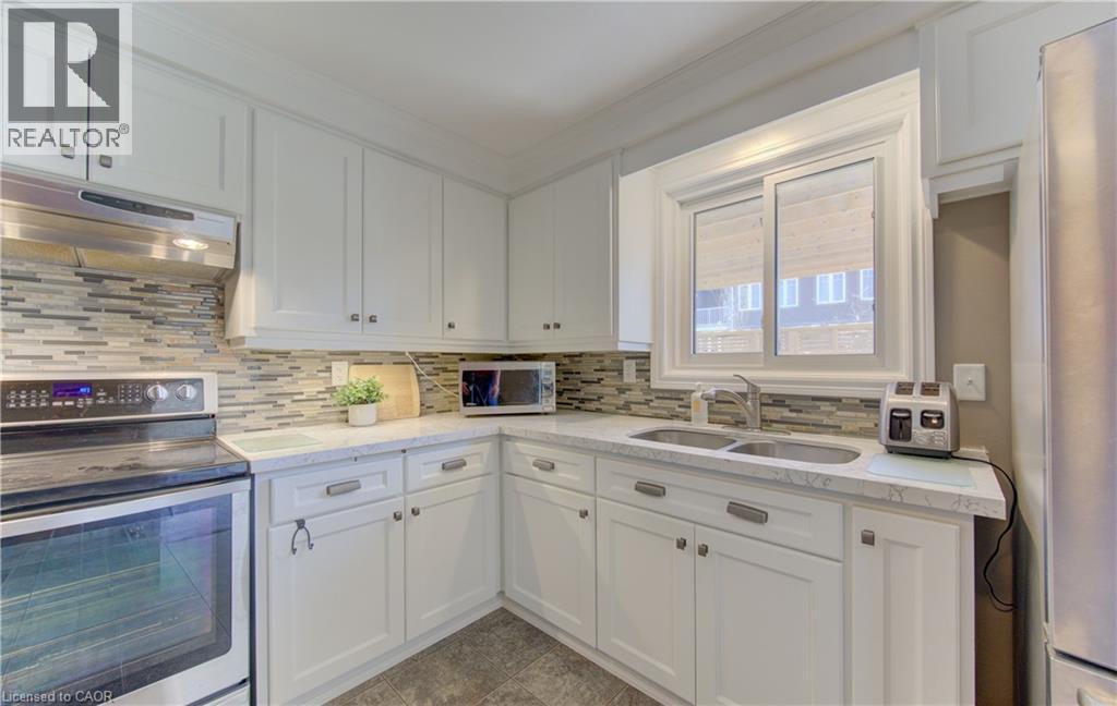 83 Manor Drive, Kitchener, ON - Indoor Photo Showing Kitchen With Double Sink