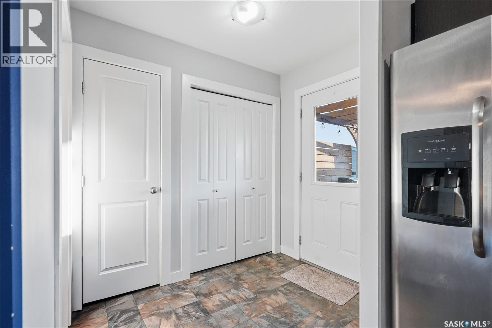 139 Maningas Bend, Saskatoon, SK - Indoor Photo Showing Other Room