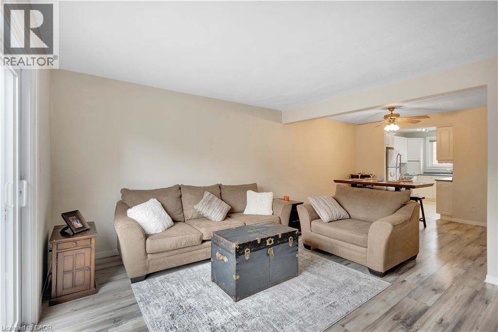 Living space featuring light-toned walls and wood-finish flooring - 32 Montclair Crescent, Simcoe, ON - Indoor Photo Showing Living Room
