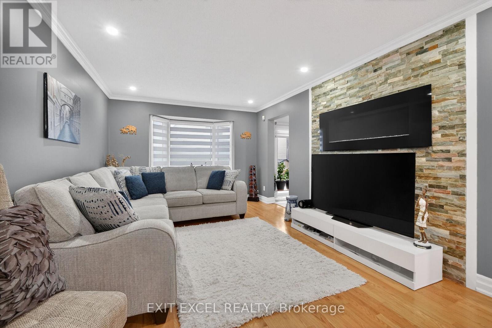 58 Fireside Crescent, Ottawa, ON - Indoor Photo Showing Living Room With Fireplace