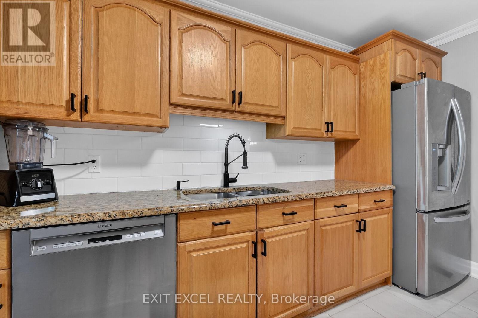 58 Fireside Crescent, Ottawa, ON - Indoor Photo Showing Kitchen With Double Sink