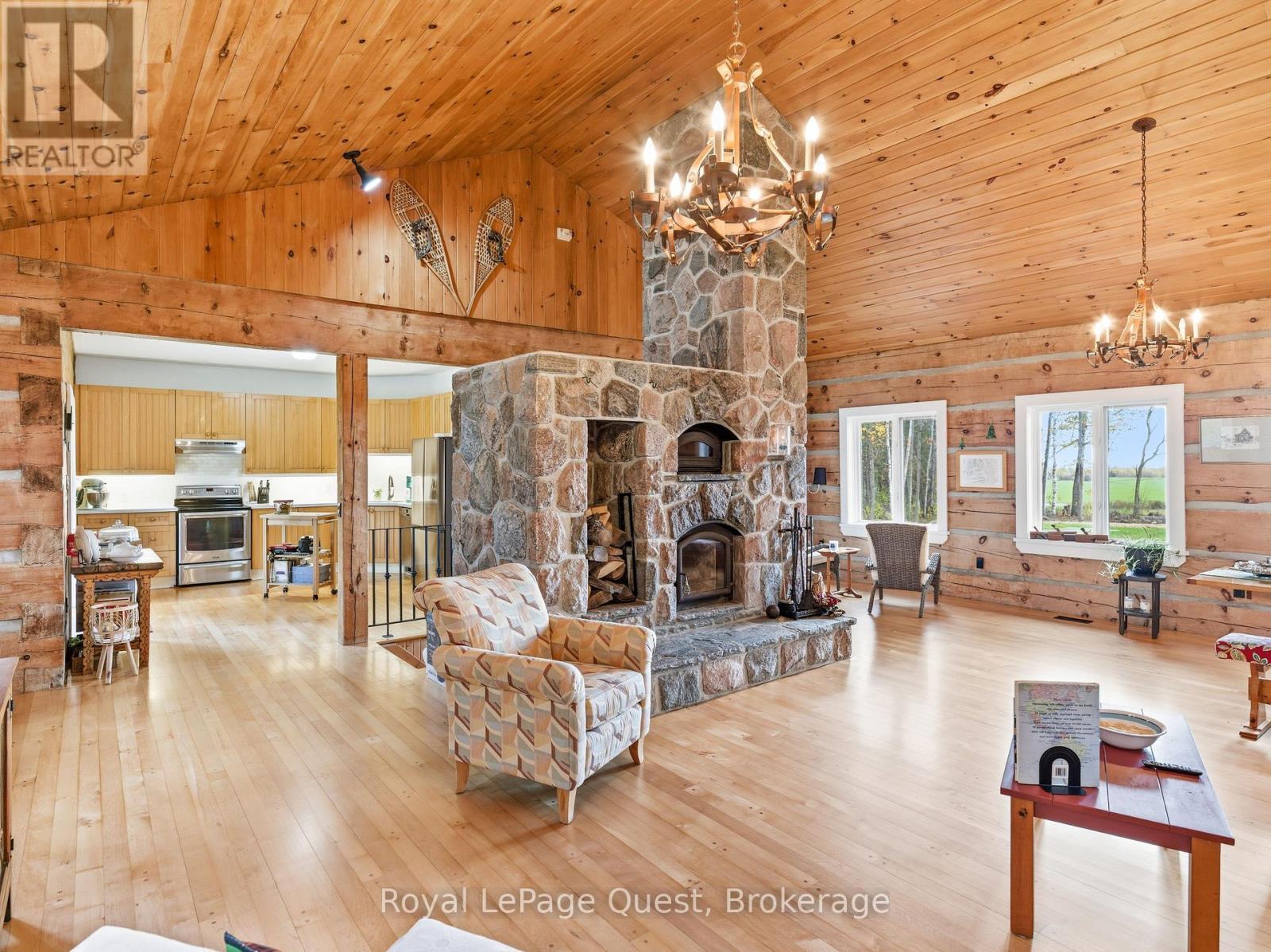 160 14 Concession W, Tiny, ON - Indoor Photo Showing Living Room With Fireplace